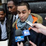 Police brutality victim MIichael Mineo, of Brooklyn, speaks to the media outside Brooklyn state supreme court Tuesday, Dec. 9, 2008, in New York, following the arraignment of three police officers charged with felonies for an attack last Oct. 15 on the tattoo parlor worker.